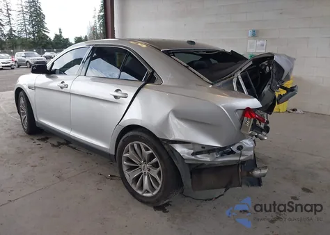 2015 Ford Taurus Limited z USA, uszkodzony, nr VIN 1FAHP2F98FG142912